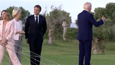 videos g|Video at G7 shows Biden talking to skydivers, not wandering off.